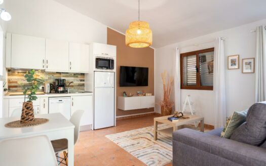 A charming bungalow in a quiet complex next to the golf course