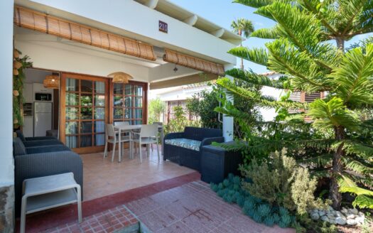 A charming bungalow in a quiet complex next to the golf course