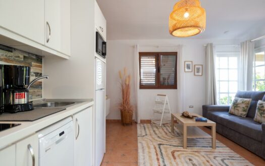 A charming bungalow in a quiet complex next to the golf course