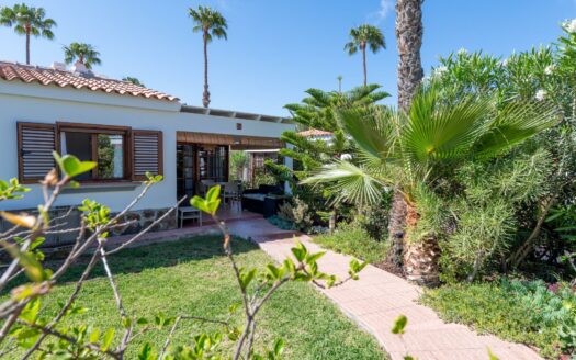 A charming bungalow in a quiet complex next to the golf course