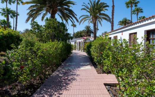 A charming bungalow in a quiet complex next to the golf course