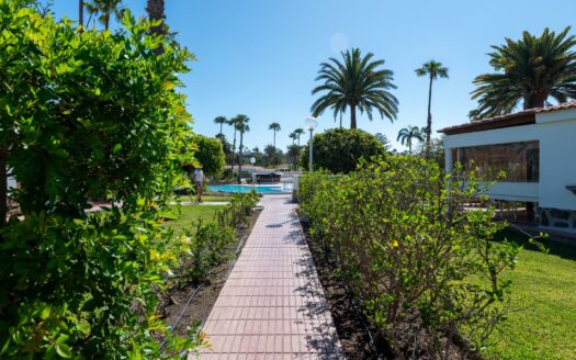 A charming bungalow in a quiet complex next to the golf course