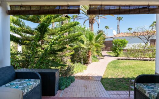 A charming bungalow in a quiet complex next to the golf course