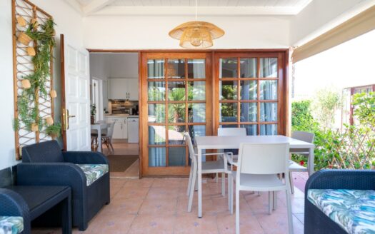 A charming bungalow in a quiet complex next to the golf course