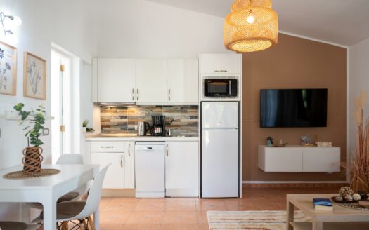 A charming bungalow in a quiet complex next to the golf course