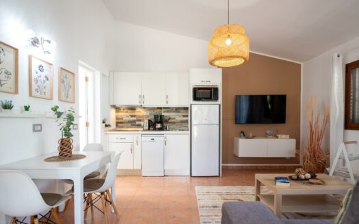A charming bungalow in a quiet complex next to the golf course